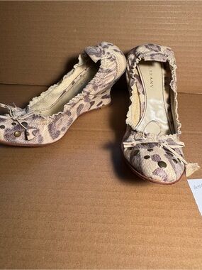 Beige Leopard-Print Ruffle with Stud Accents wedge shoes.